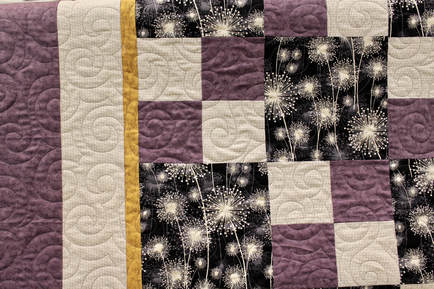 Picture of Jessie's Swirls Pantograph on Purple White and Black Quilt
