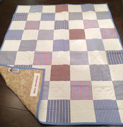 Photo of custom baby quilt made with men's shirts
