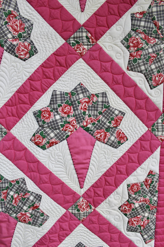 Photo of longarm quilting sample by Foxtail Quilting